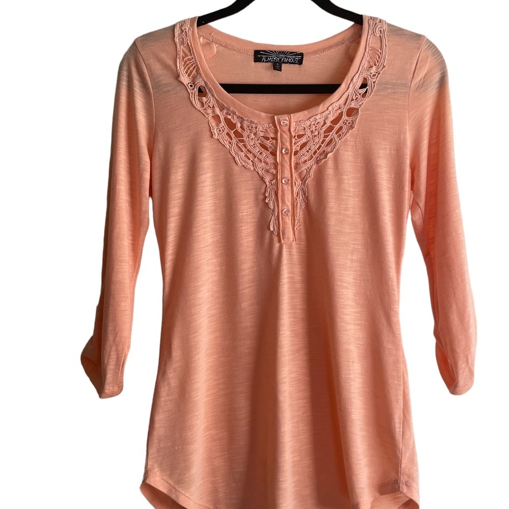 Almost Famous woman’s peach‎ knit top, embroidered neckline, size large